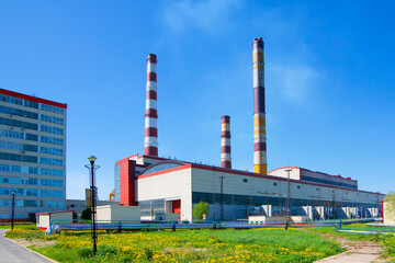 Fototapeta na wymiar The power plant building. Industrial factory. General view