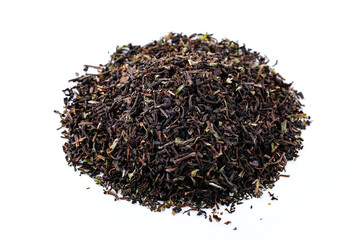 Heap of black tea on a white background. Dry black tea leaves isolated on white background, delicious, natural. Flat lay.