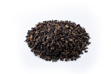 Heap of black tea on a white background. Dry black tea leaves isolated on white background, delicious, natural. Flat lay.