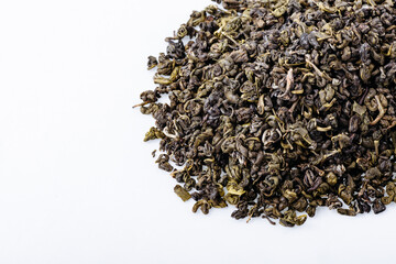 Green tea with jasmine on white background. Top view. Close up. High resolution