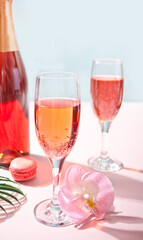 Summer tropical pink cocktail decorated pink orchid flowers.