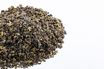 Green tea with jasmine on white background. Top view. Close up. High resolution