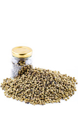 Dry bunch of green peppercorns, peppercorns isolated on white. Spice jar.Green peppercorns. Heap of tea on a white background. Close up. A high resolution.