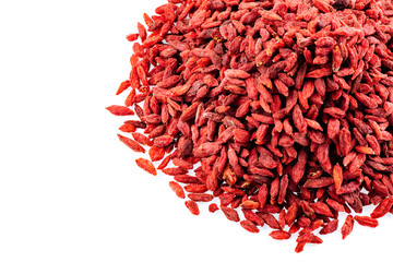 Fototapeta premium Heap of Goji berries on a white background. Pile of goji berries isolated on a white background.
