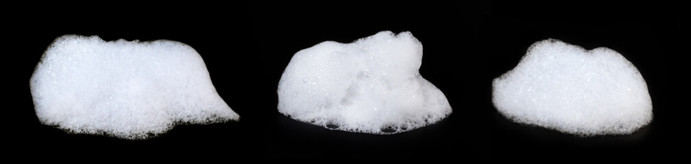 A heap of soap sud isolated on black background. Collection.