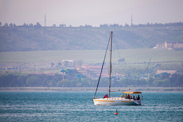 Sailing. Ship yachts with white sails in the open Sea. Luxury boats