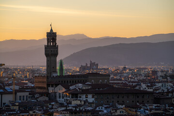 Fototapeta premium Florence or Firenze sunset aerial cityscape. Panorama view from Michelangelo park square. Ponte Vecchio bridge, Palazzo Vecchio and Duomo Cathedral. Tuscany, Italy