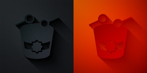 Paper cut Ramadan drum icon isolated on black and red background. Paper art style. Vector