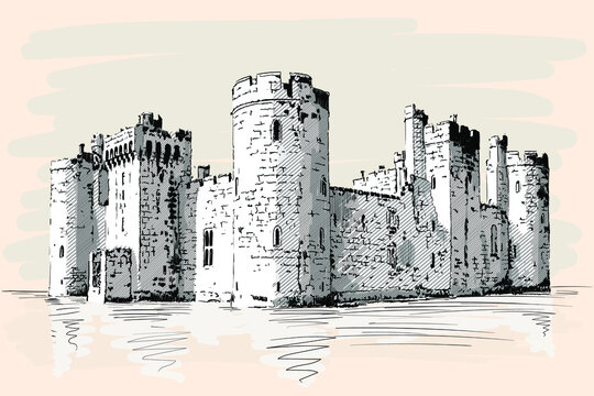 Medieval stone castle with towers and arches on the sea shore.