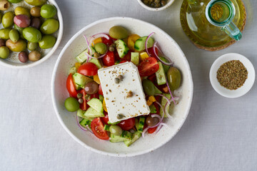 Greek village salad horiatiki with feta cheese and vegetables, vegeterian mediterranean food, low calories keto dieting meal