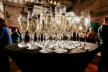 champagne glasses on the table in a event
