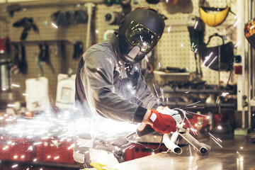 Fototapeta na wymiar welder at work in a workshop