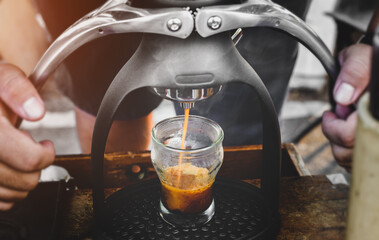 Handmade Rok coffee maker espresso shot.