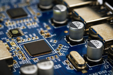 Microchips by other elements on a circuit board.	