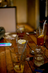 Fototapeta na wymiar glass of lemon tea and cocktail on table