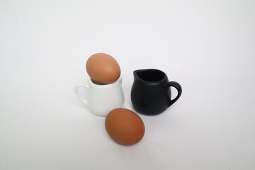 Eggs with glass have a white background