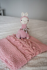 Fototapeta premium close up shot of cozy soft handmade hobby knitted toy 