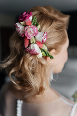 Wedding hair decoration from pink flowers