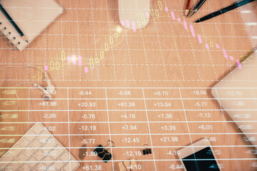 Multi exposure of forex graph hologram over desktop with phone. Top view. Mobile trade platform concept.