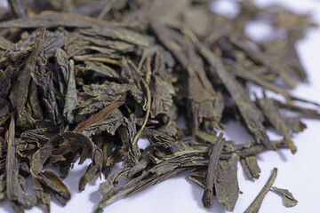 Green tea dried and rolled leaves