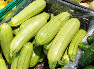Zucchini on the counter in the store, organic vegetable