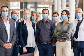 Fototapeta na wymiar Portrait of multiethnic business people group wearing mask