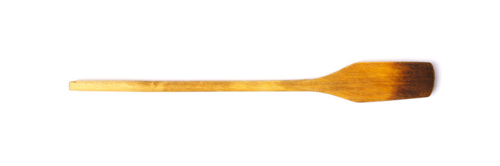 wooden spatula isolated on white background, close-up