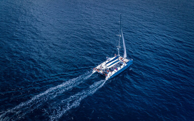 Beautiful Aerial shot of yacht cruise at sea in Ibiza Spain VIP luxury