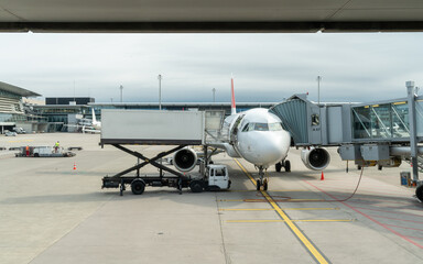 Passanger plane parked at the airport ready to load