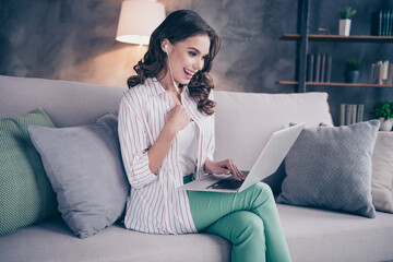 Obraz premium Profile photo of nice optimistic brunette curly hairdo lady wear white shirt write laptop alone at home