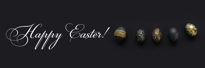 Black easter eggs with gold pattern on black