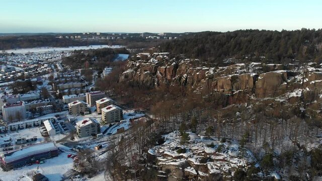 Mountain and Snow Covered Urban Residential Buildings, Winter, Aerial