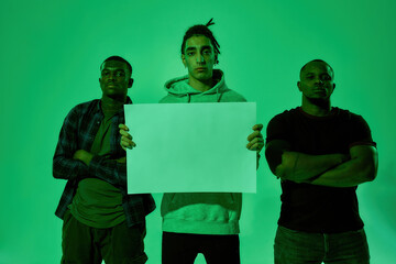 Gipsy man side by side with african american men