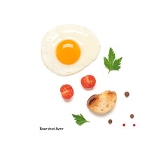 Fried egg isolated on a white background with tomato, spices and toast. Creative layout. Top view, flat lay. Breakfast concept.