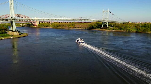 Aerial View of a Ferry Boat Approaching the RFK and Hell Gate Bridge - Part 2