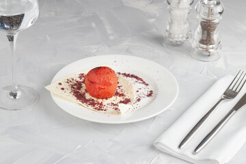 Grilled tomato with hot chili, light background