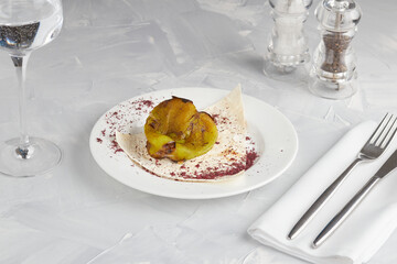 Grilled Bulgarian green pepper on a white dish
