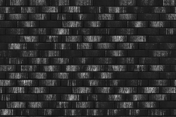 Seamless texture Brick Black and gray with a smooth transition.