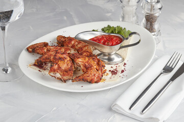 Grilled meat on a plate, serving in a restaurant