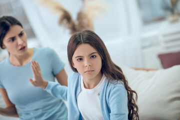 Refusing to listen teen daughter and talking serious mom