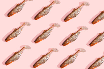 gold fishes pattern on a pink bacground