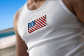 The national flag of United States of America on the athlete's chest