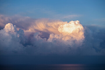 Cumulus storm clouds over the sea, weather forecast, atmospheric front