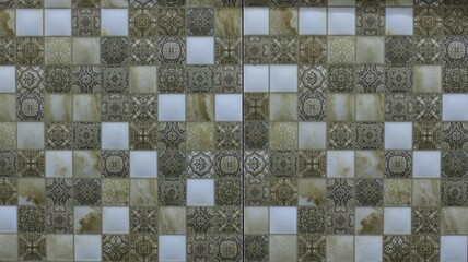 original graphic background consisting of small textured squares with different images repeating in a certain pattern, a unique decorative resource with a variegated set of tiles