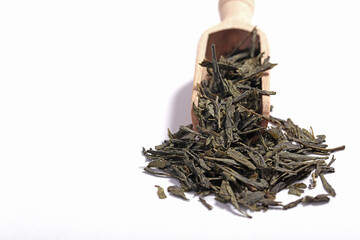 Green tea dried and rolled leaves
