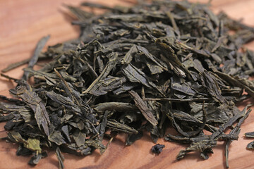 Green tea dried and rolled leaves
