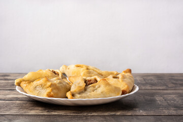Traditional middle eastern fatayer on wooden table