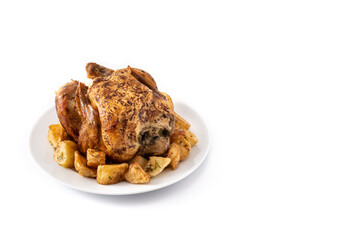 Homemade roasted chicken with potatoes isolated on white background. Copy space
