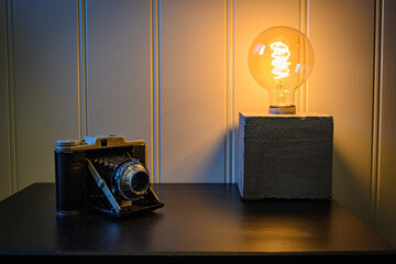 Old camera and a lamp