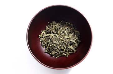 Green tea dried and rolled leaves